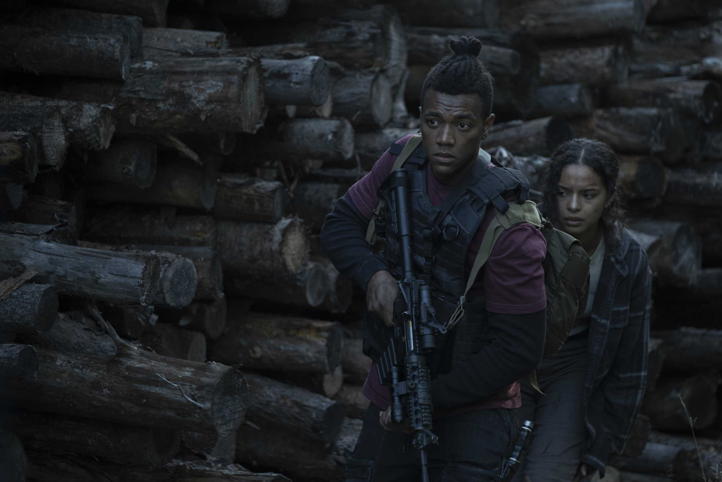 Emanuel (Kataem O'Connor) and Dawn (Milcania Diaz-Rojas) investigating an area – 40 Acres