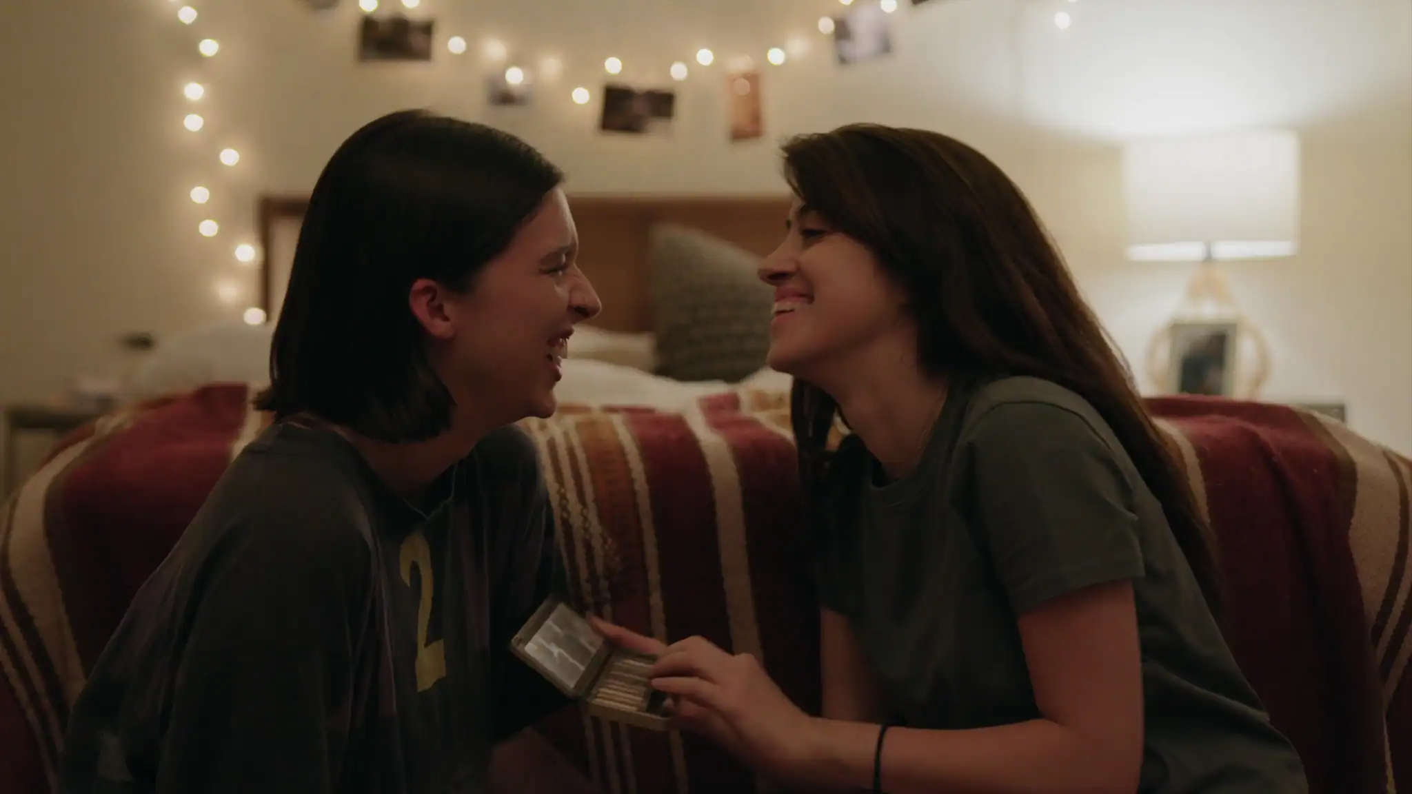 Lou (Susie Yankou) and Priya (Kausar Mohammed) laughing together | Lou Susie Yankou and Priya Kausar Mohammed – Sisters NewFest 2 Lou (Susie Yankou) and Priya (Kausar Mohammed) laughing together
