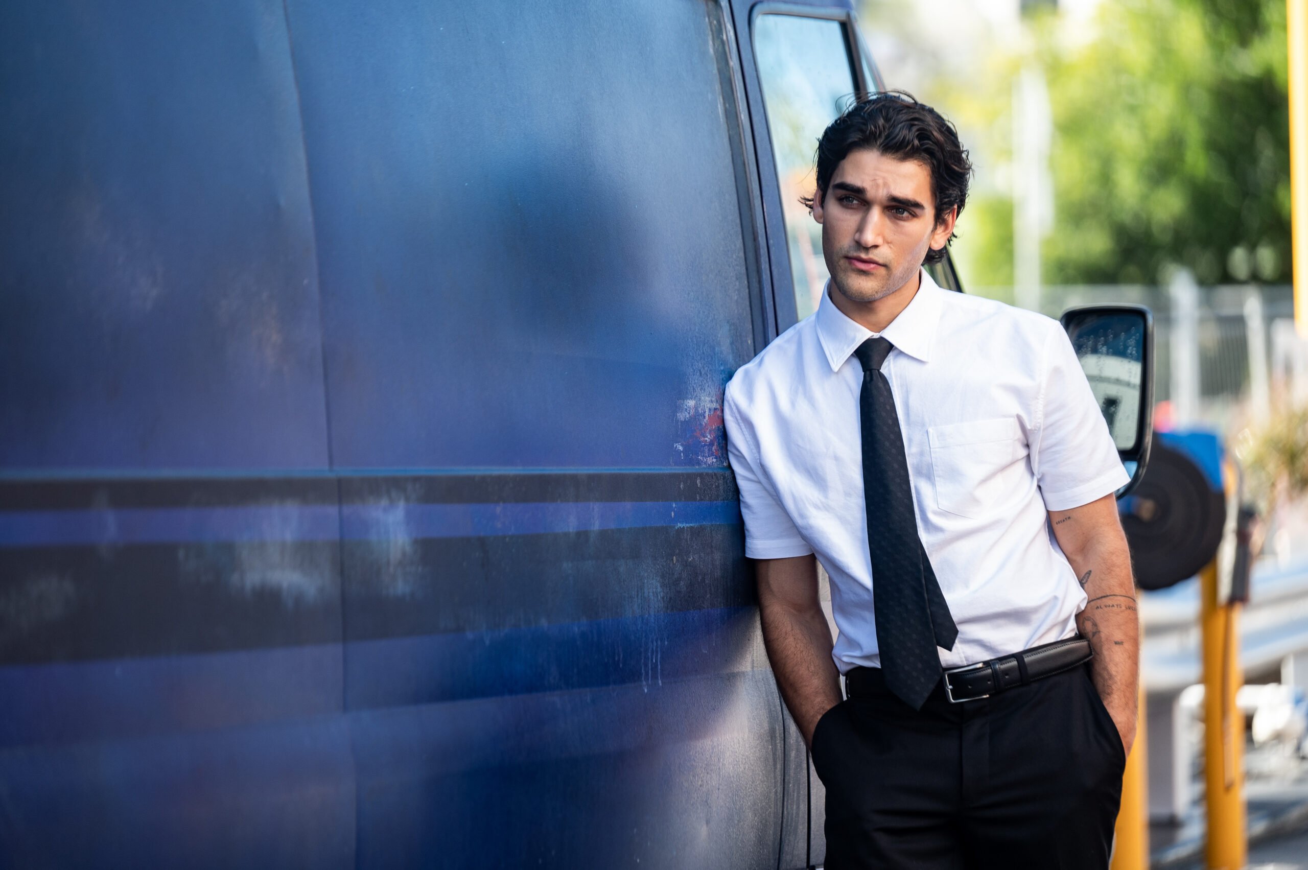 Moses (Josh Heuston) leaning against Zephyr's van in Dangerous Animals | Moses Josh Heuston – Dangerous Animals 3 scaled Moses (Josh Heuston) leaning against Zephyr's van in Dangerous Animals