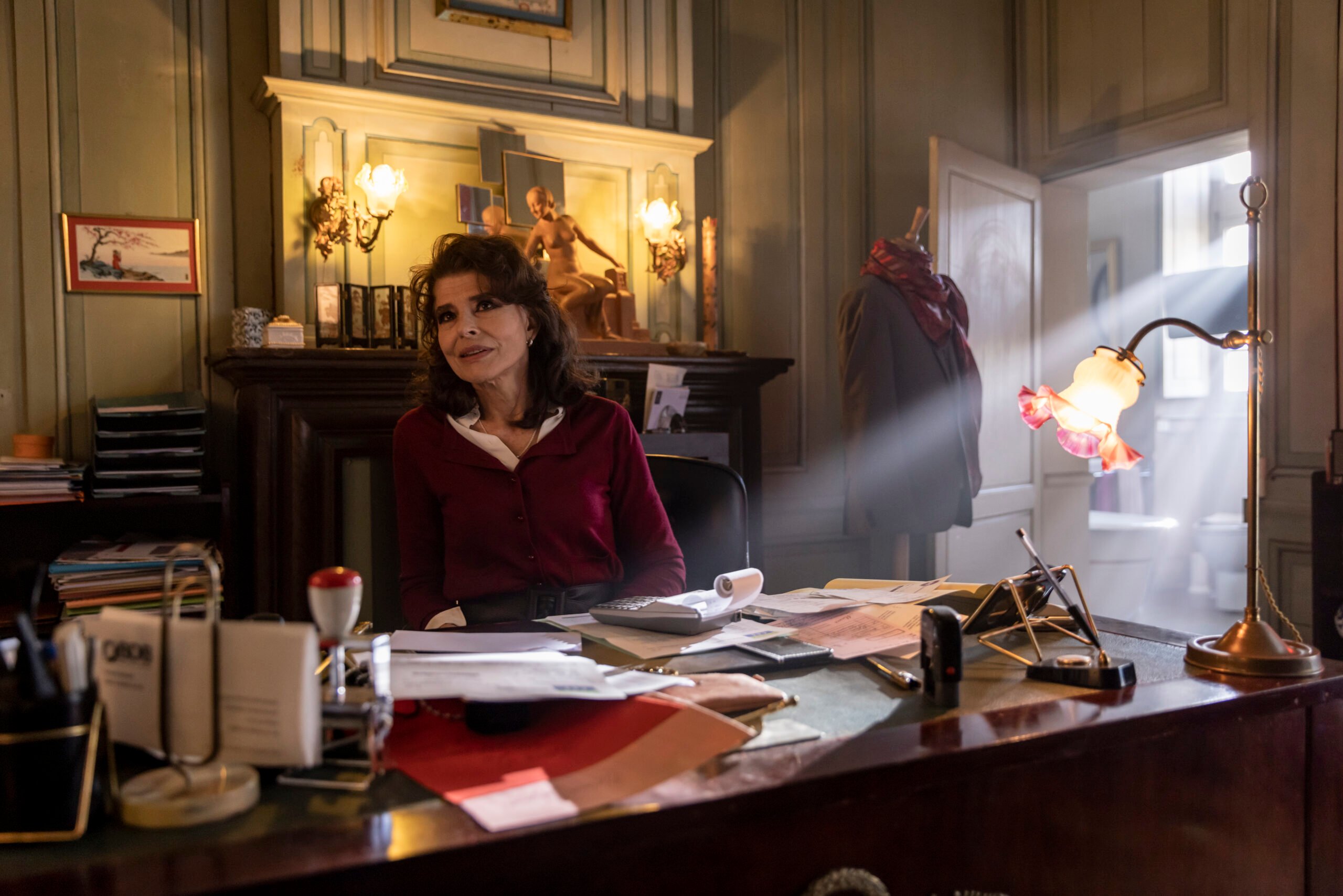 Nathalie (Fanny Ardant) at her desk – Mr. Blake At Your Service