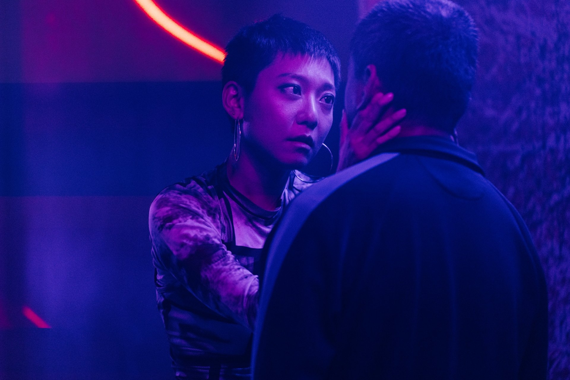 Peiying (Anicca Panna) talking to Wu, hoping he will tell her where her daughter is – Stranger Eyes (Source; Film Movement)