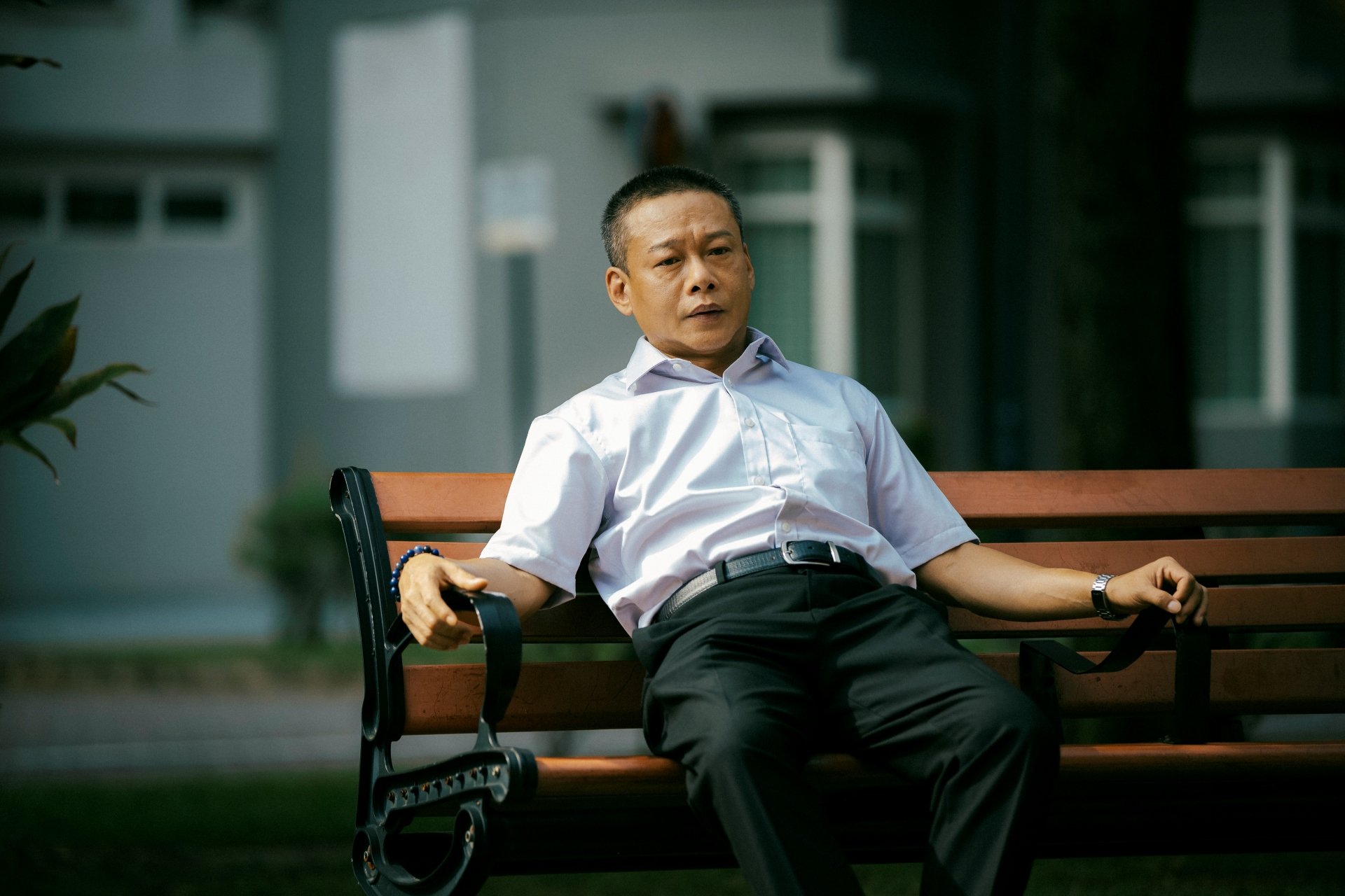 Wu (Kang-sheng Lee) at the playground that Little Bo was taken from – Stranger Eyes (Source; Film Movement)