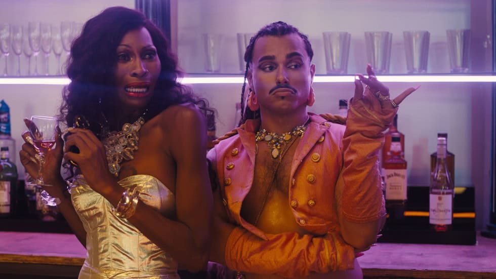 Yasmine (Dominique Jackson) and Niko (Tomas Matos) scared and having a drink in Queens of the Dead