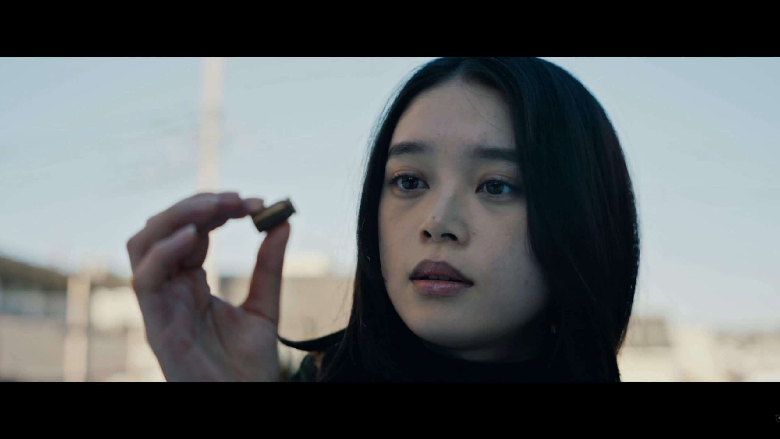Fumika (Akari Takaishi) holding a bullet – Ghost Killer