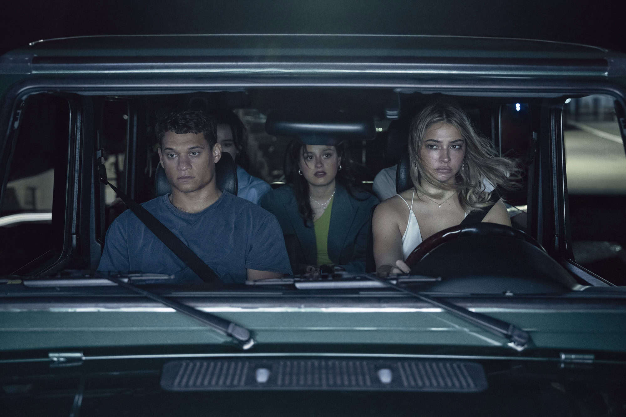 Teddy (Tyriq Withers), Ava (Chase Sui Wonders) and Danica (Madelyn Cline) driving after the accident – I Know What You Did Last Summer
