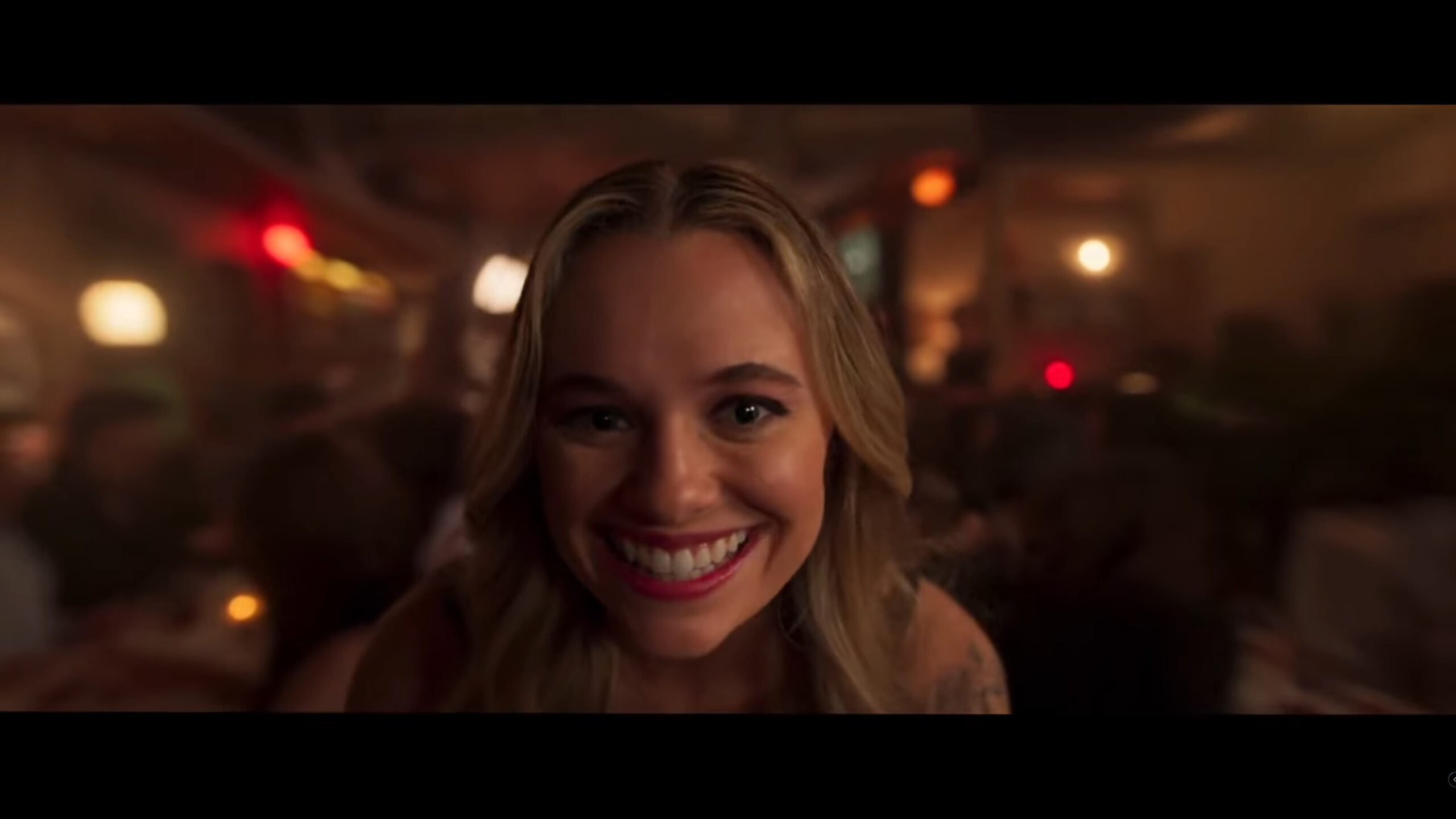 Emily (Madison Iseman) with exaggerated features due to the person looking at her being under the influence – Witchboard