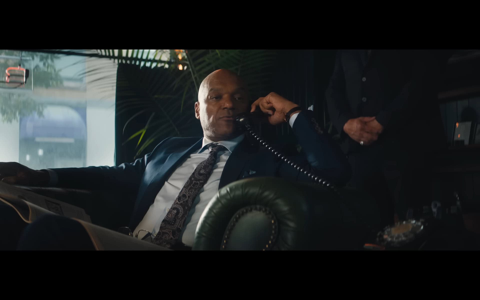 The Barber (Colin Salmon) on the phone – Nobody 2