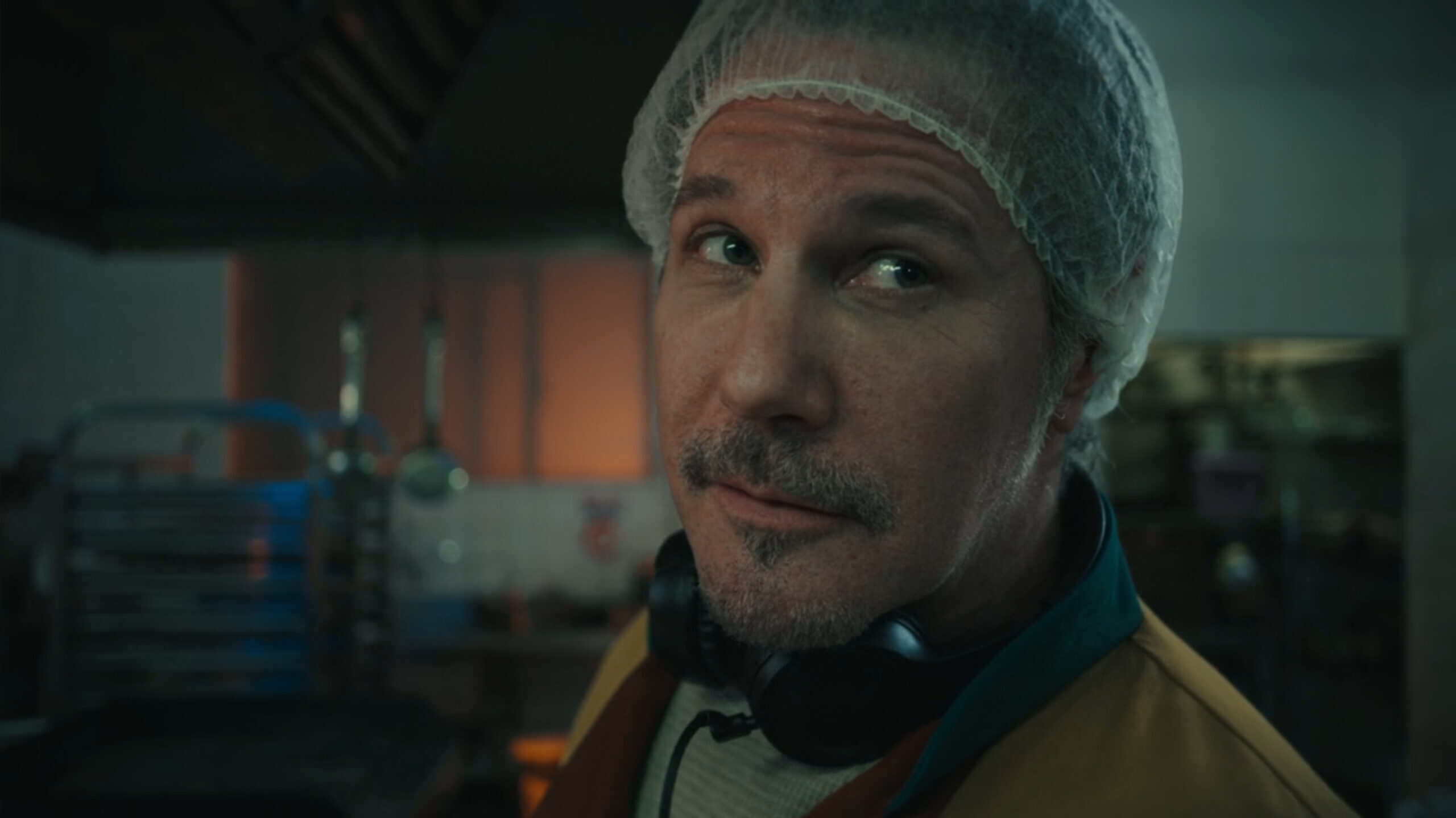 Benny (Darron Meyer) talking to a cop – Takeout