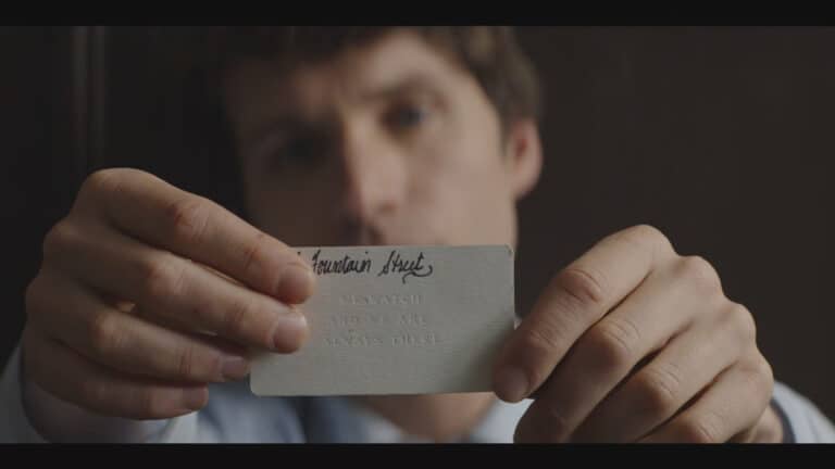 Helen's Card which reads "We watch and we are always there" - Talamasca – The Secret Order Season 1 Episode 1