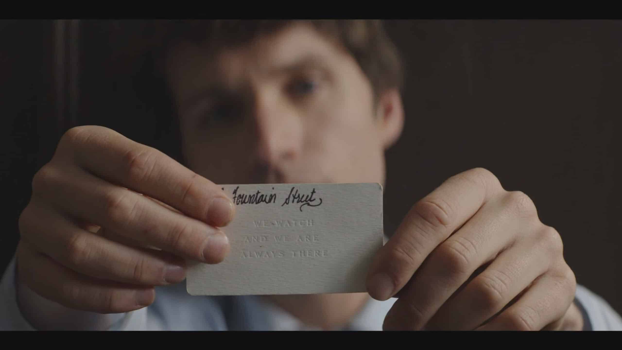 Helen's Card which reads "We watch and we are always there" - Talamasca – The Secret Order Season 1 Episode 1