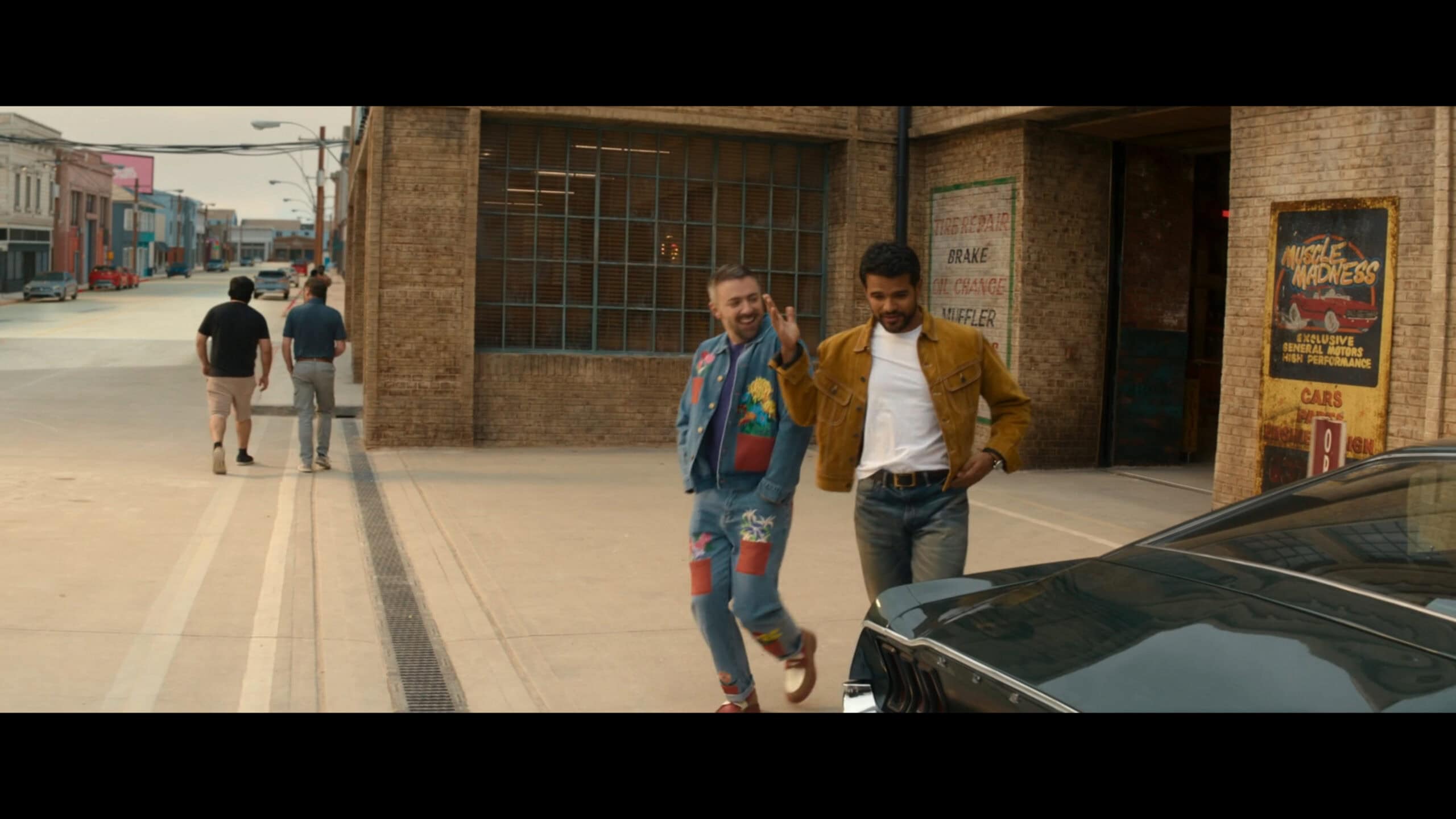 Jordan (Matteo Lane) and Beau walking out of Charlie's shop – Maintenance Required
