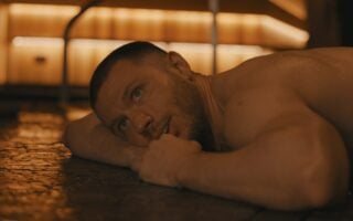 Kell (Jeremy Feight) laying down at the spa – Spa Night