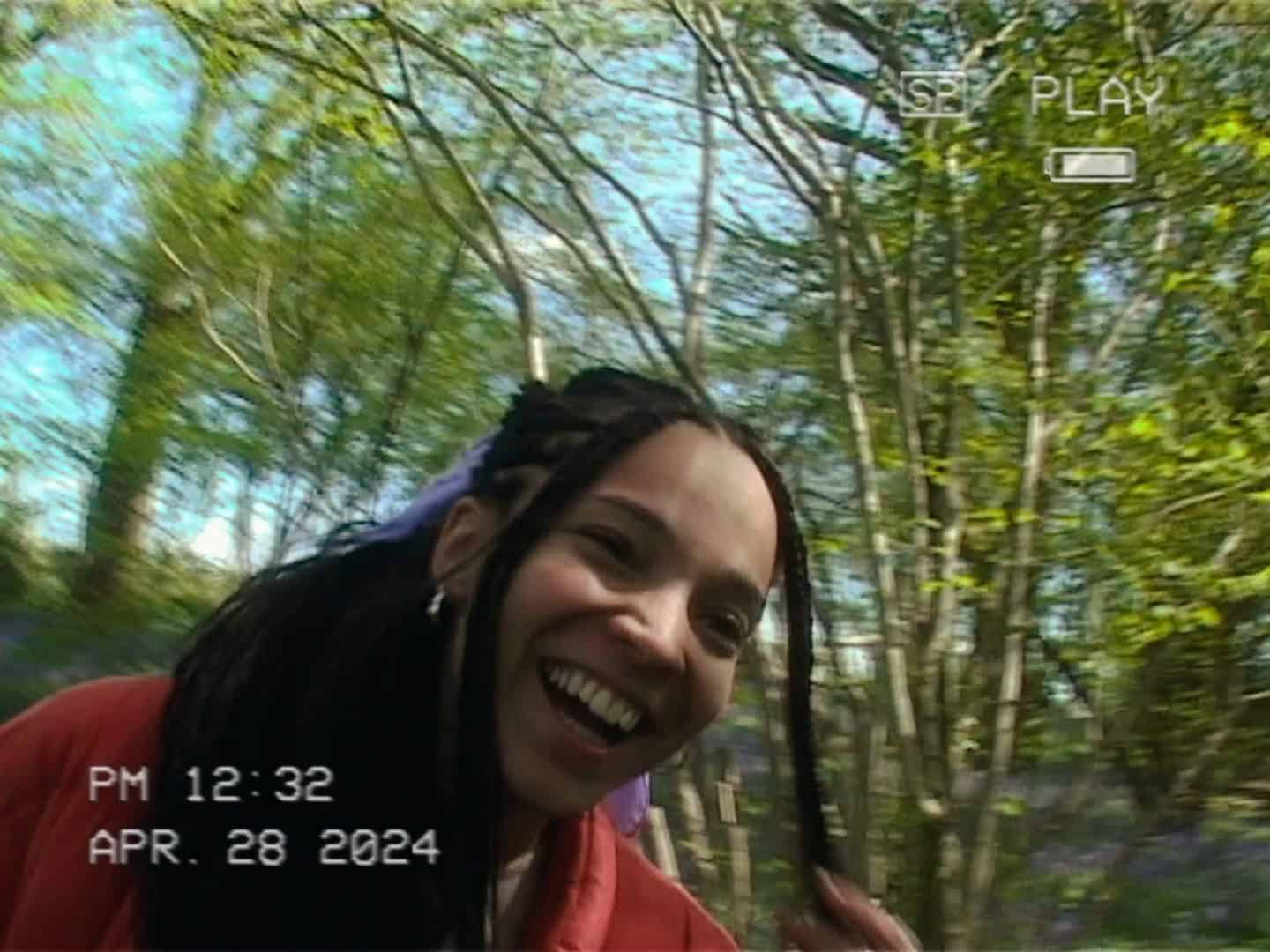 Violet (Talitha Wing) smiling in a video Blue is taking – Blue Violet