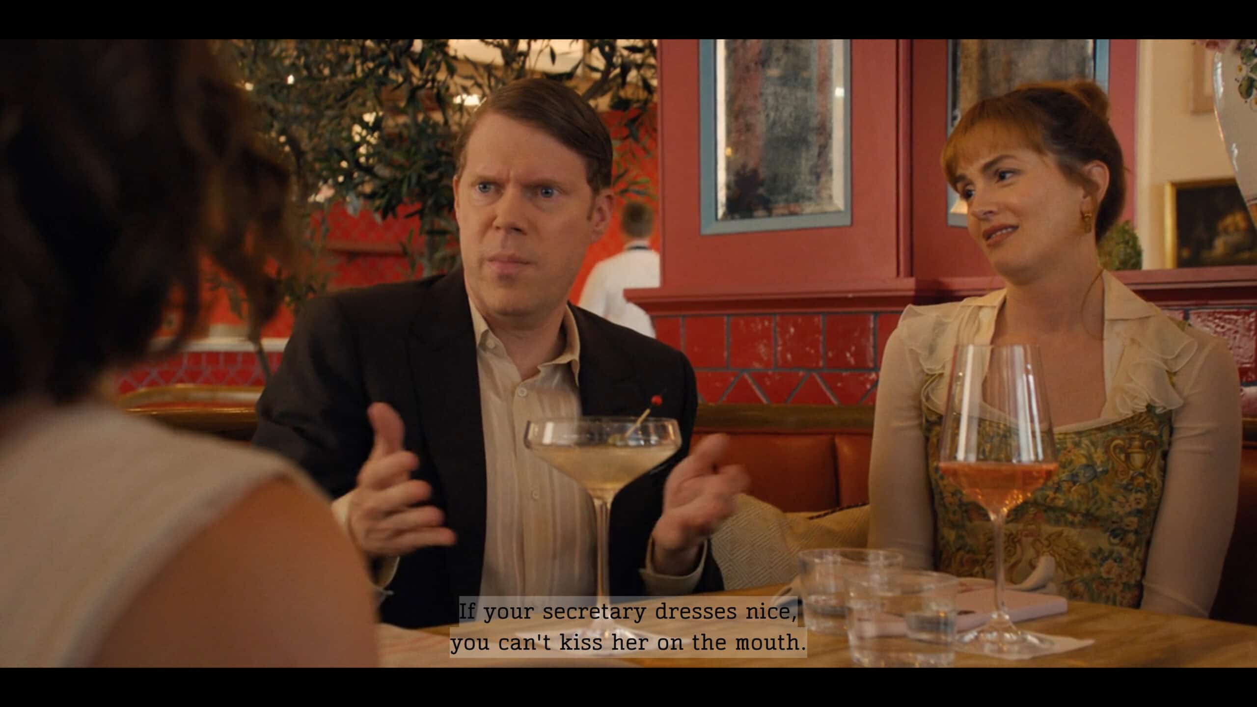 Antoine (Tim Baltz) talking to Maia who crashed his meeting with Alyssa - I Love LA Season 1 Episode 7