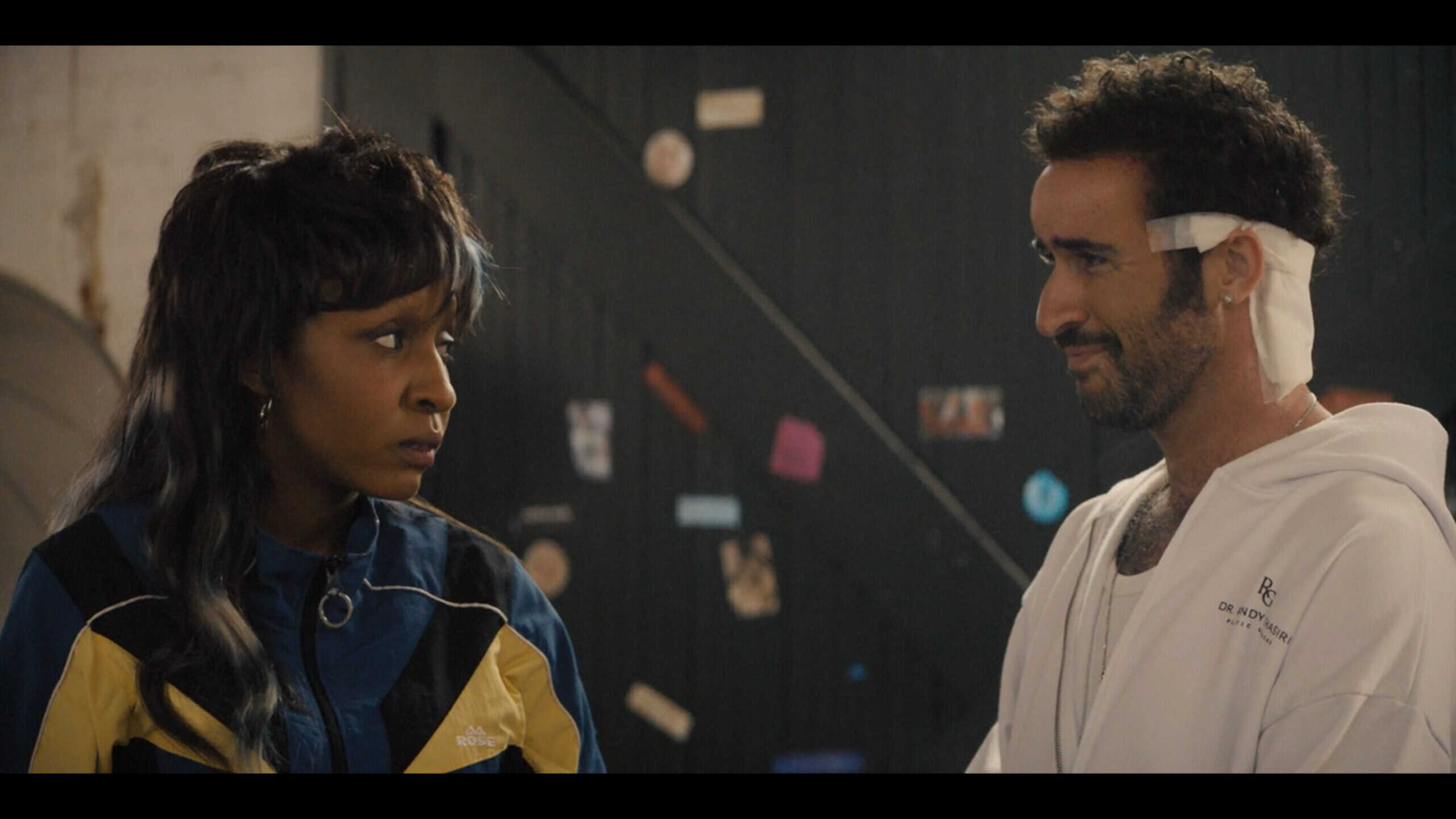 Mimi and Charlie discussing him rejoining her team - I Love LA Season 1 Episode 7