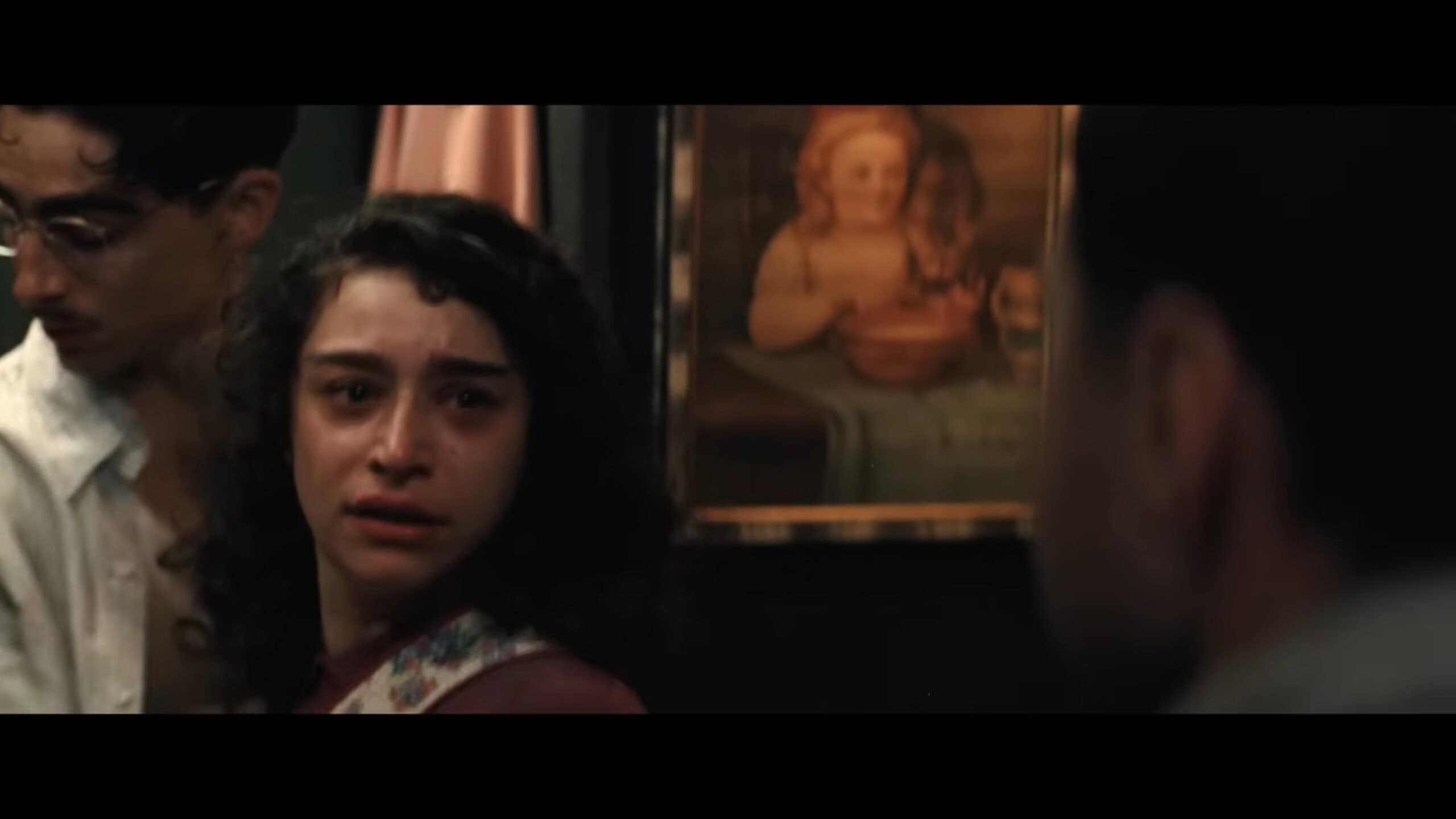 Rachel (Odessa A'zion) caught hugging Marty by her husband, who suspects something is going on in Marty Supreme